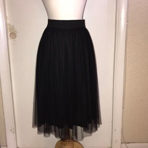 Ladies fancy black skirt.